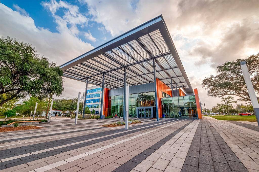 Outdoor Spaces include an open-air stage, sprawling lawn, playground and two pavilions.