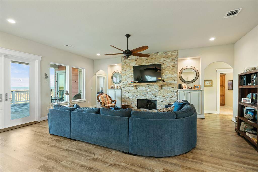 Living room features a gas log fireplace for those cool evenings.