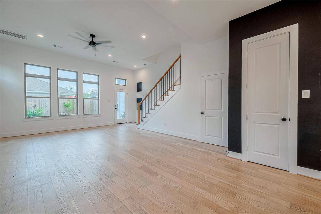 Living room with plenty of natural light and abundant space!