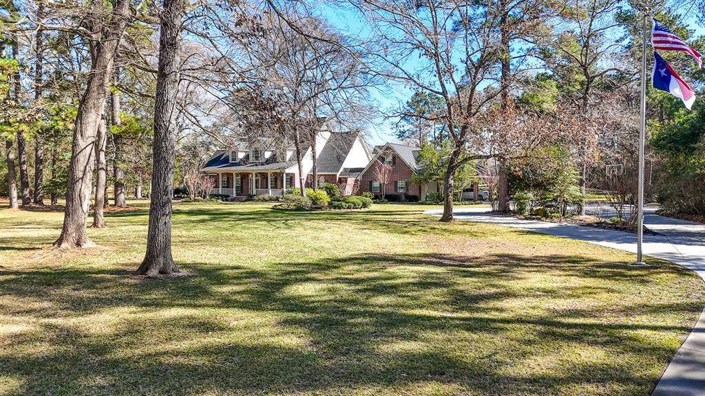 Welcome to this exquisite property with nearly 5 acres located in Magnolia's beautiful Glenmont Estates.