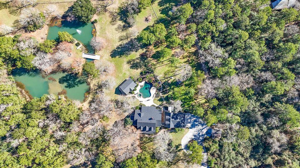 Aerial view of the estate and property.  The pond was cleaned, added an aerator and had additional large mouth bass & bluegill added in April 2022