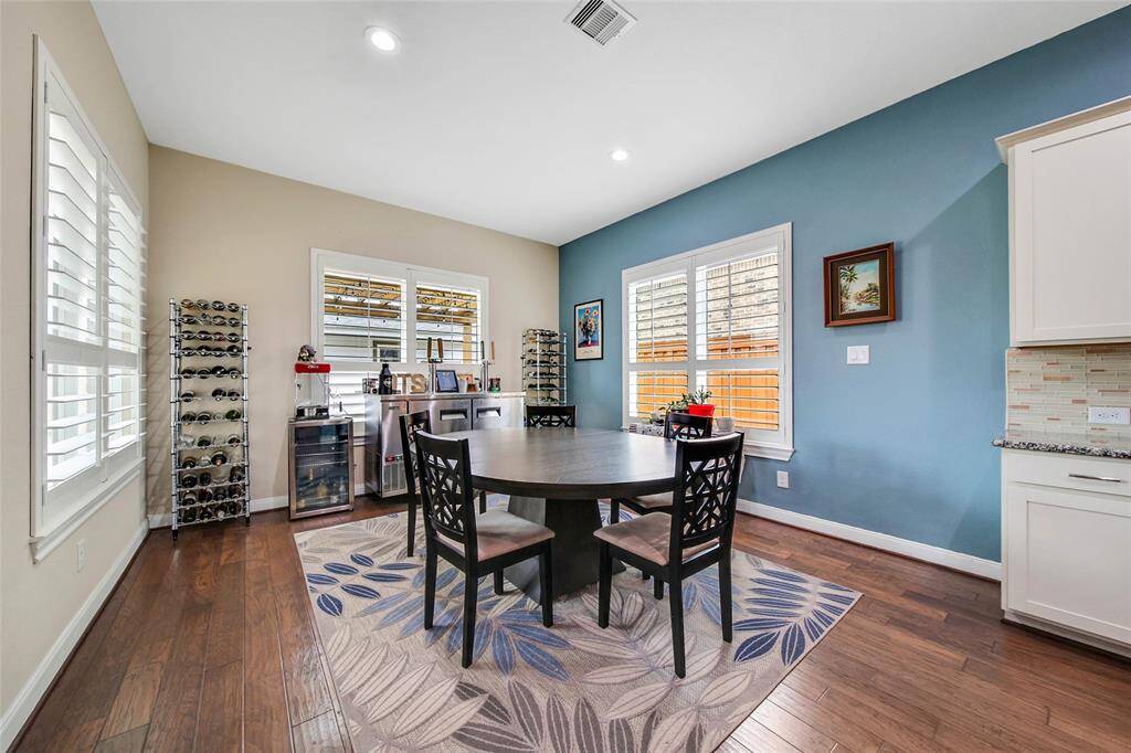 The large casual dining area is comfortable for everyday meals with your family but large enough for a table to easily host guests.