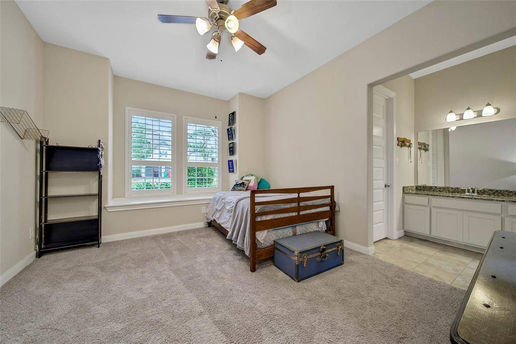 The secondary bedrooms are spacious and bright with generous walk-in closets.
