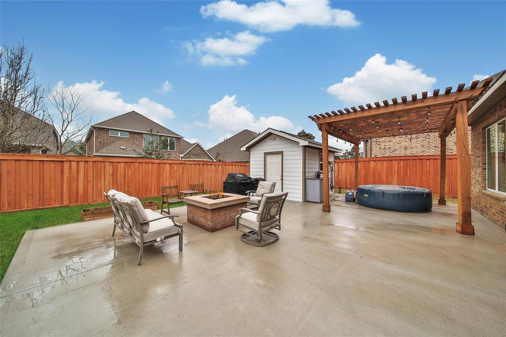 The extended patio with a gas firepit is wonderful for entertaining.