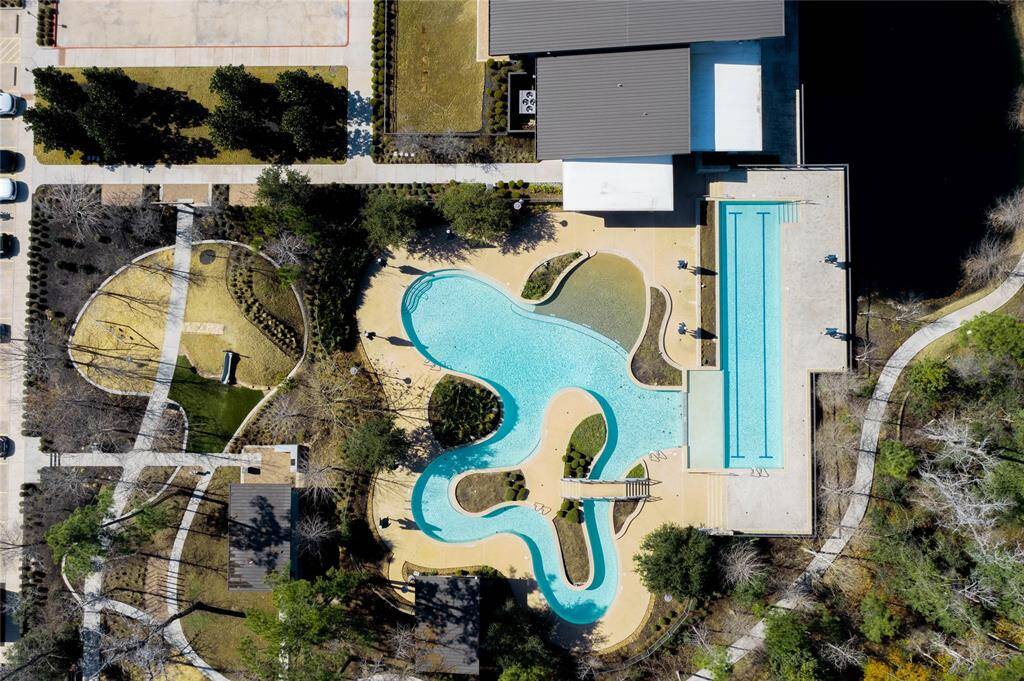 The main clubhouse features a community room, gym, lazy river pool, and lap pool.