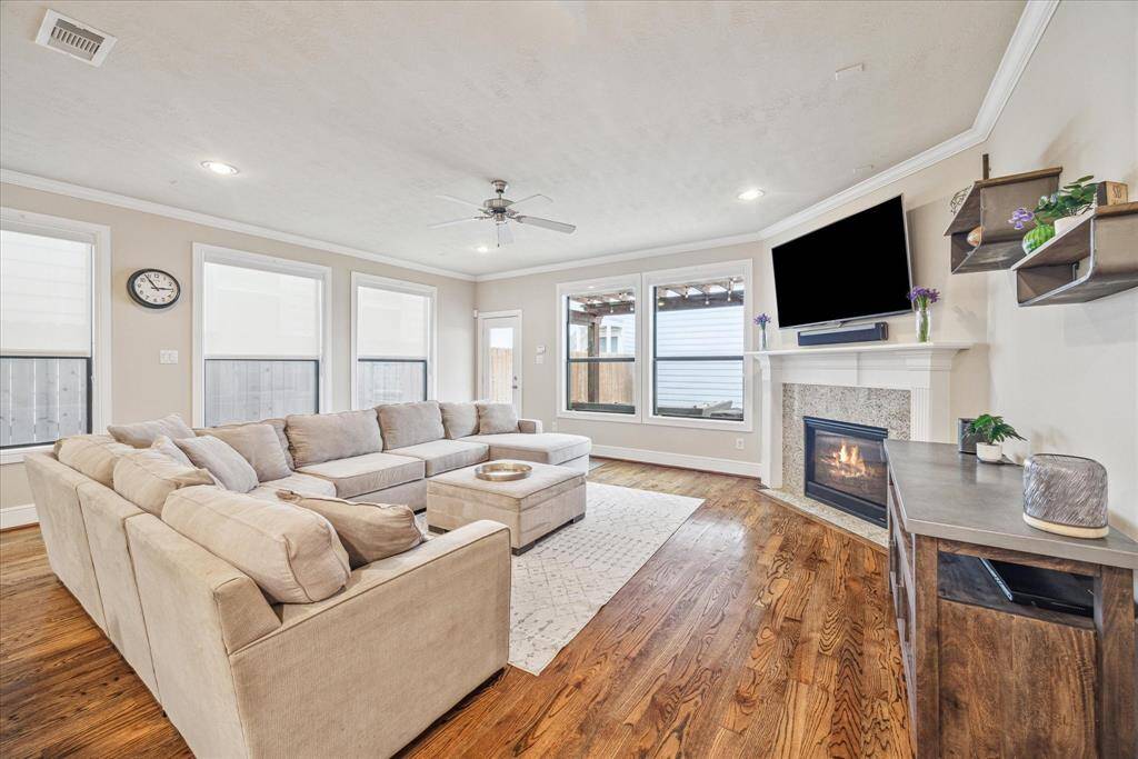 Spend quality time with family or entertain friends in the spacious family room, complete with a gas log fireplace.