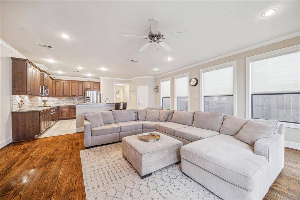 Another view of the open-concept family room and kitchen.