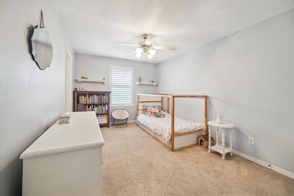 One of the two secondary bedrooms.
