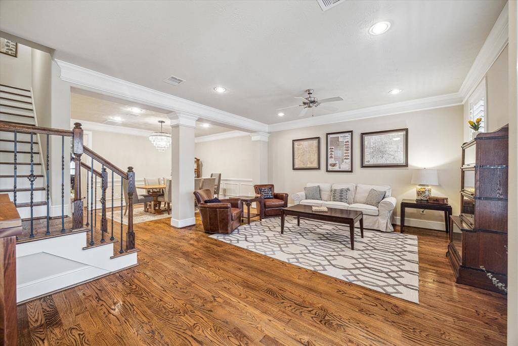 As you step inside, the formal living room creates a warm and inviting atmosphere for your guests.
