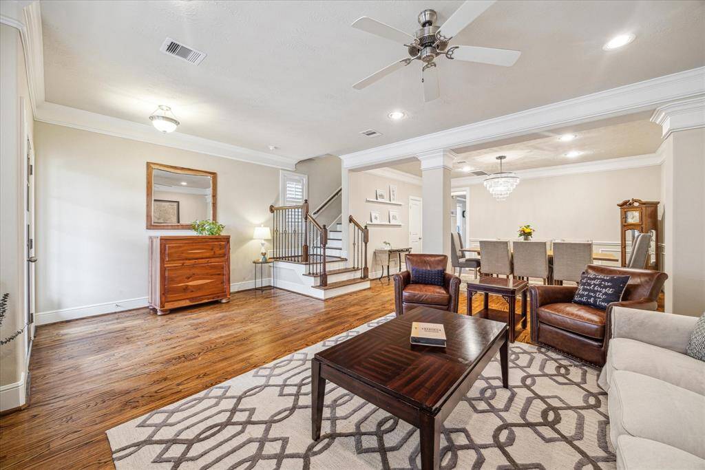 The seamless transition from the open living area to the dining room.