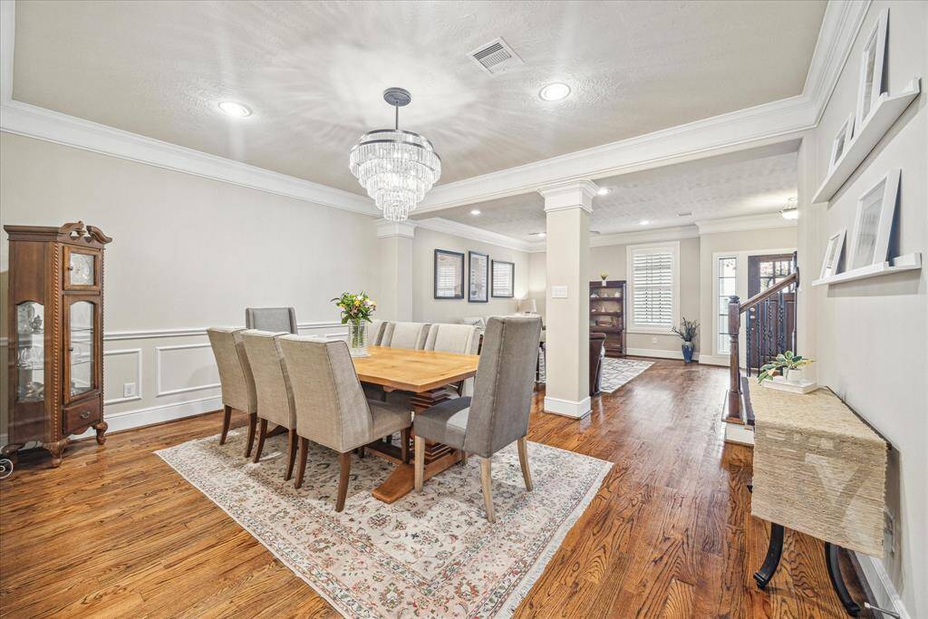 A glimpse of the seamless flow between the dining and living rooms.