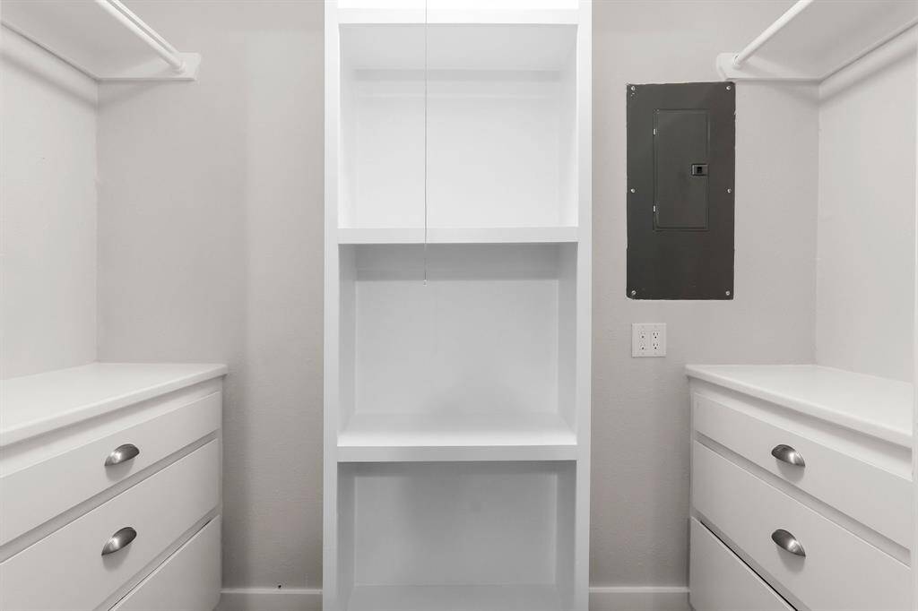 Downstairs closet with generous storage space.