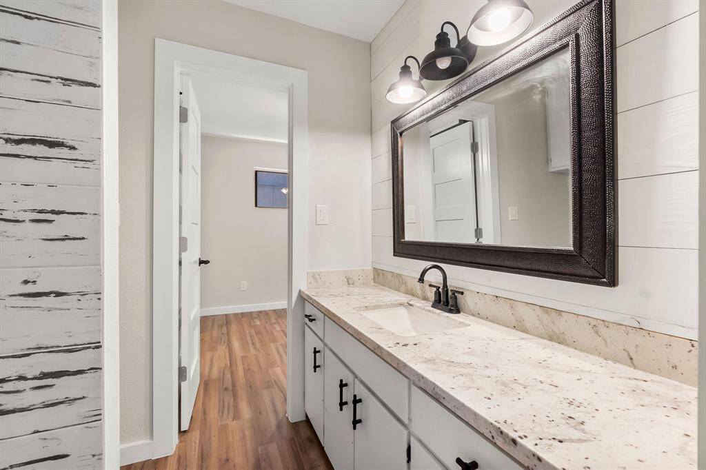 Downstairs bath has access from the bedroom and living area