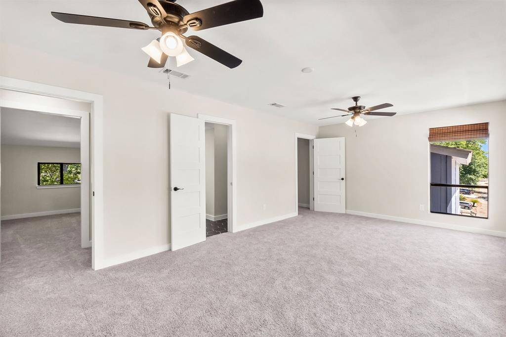 Upstairs primary bedroom with ensuite bathroom