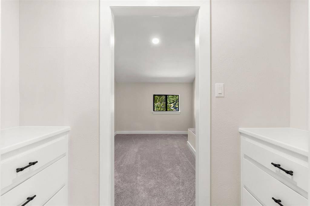 Enjoy plenty of storage with the built-in dressers