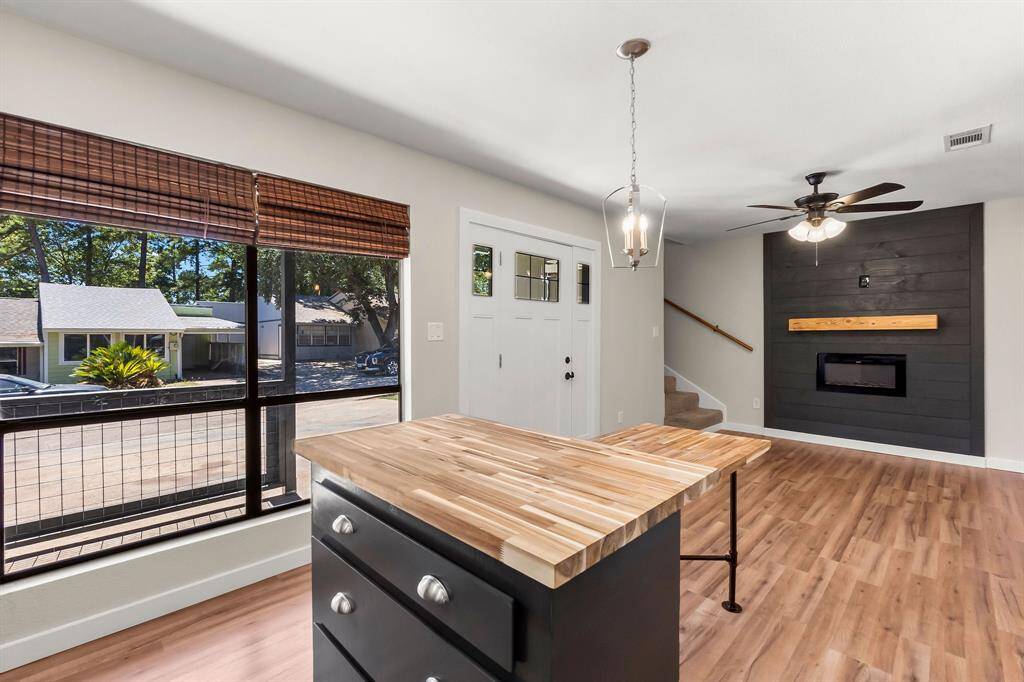Abundant natural light fills the space through large windows.