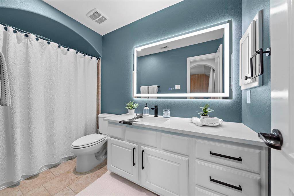 All secondary bathrooms present custom marble countertops, mirrors and cabinet hardware to complete the luxury look.