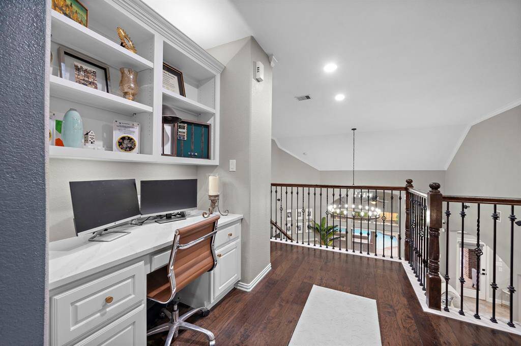 Built-in desk with shelving. Great for homework or a second workspace.