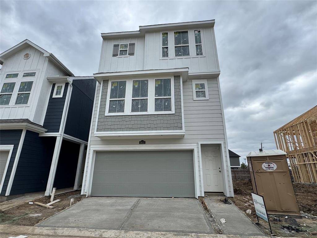 Three-story home with 4 bedrooms, 3.5 baths and 2 car garage