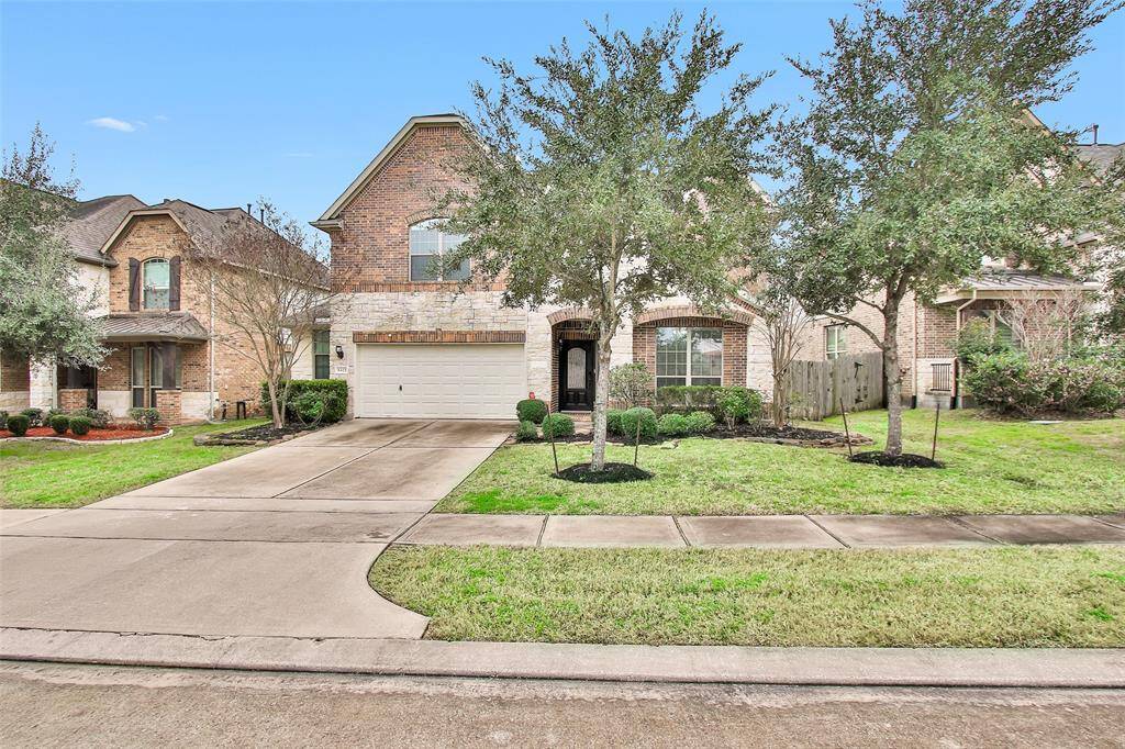 The stone and brick exterior give this home great curb appeal.
