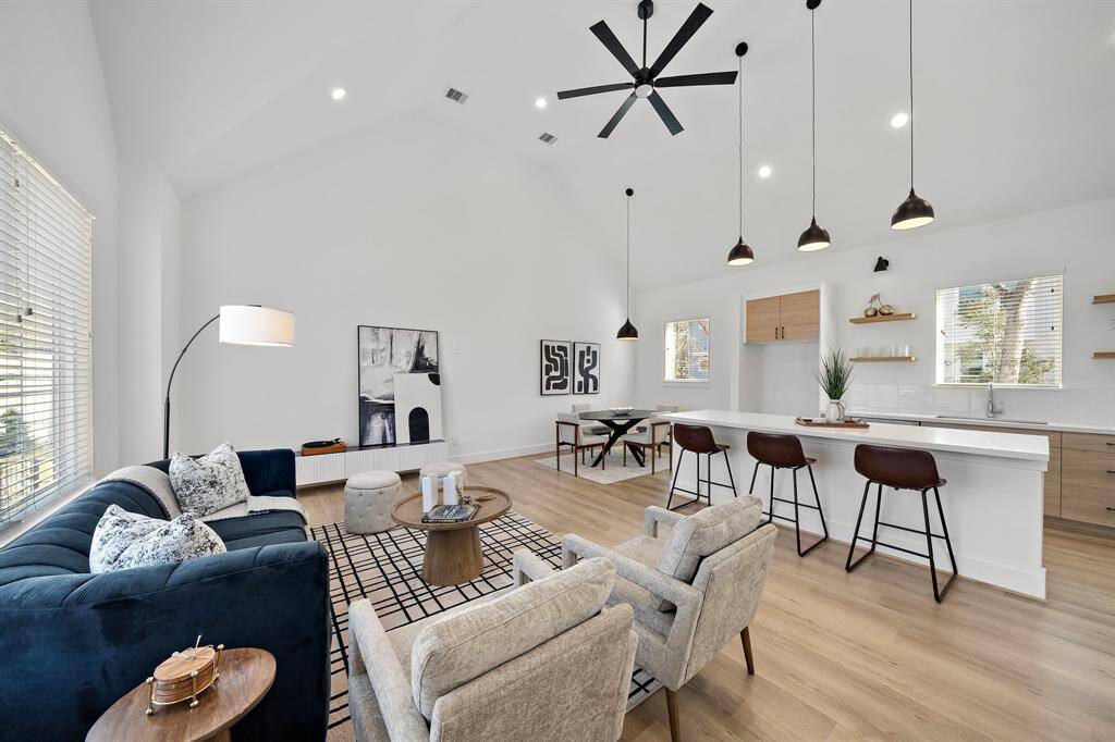 STAGED PHOTOS ARE OF UNIT C! Another vantage point of this magnificent living/dining/kitchen space!