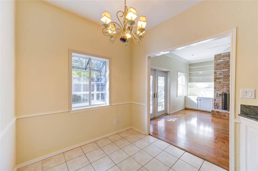 Cozy family room view from the bright breakfast area.