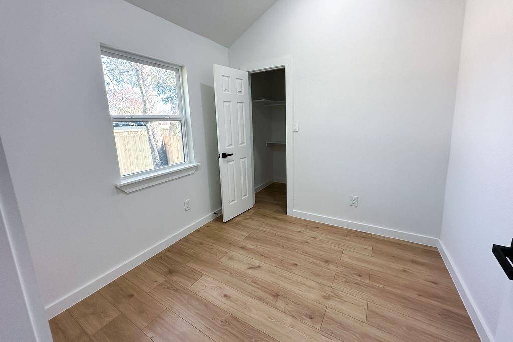 Versatile bedroom with closet, perfect as a 4th bedroom or home office.