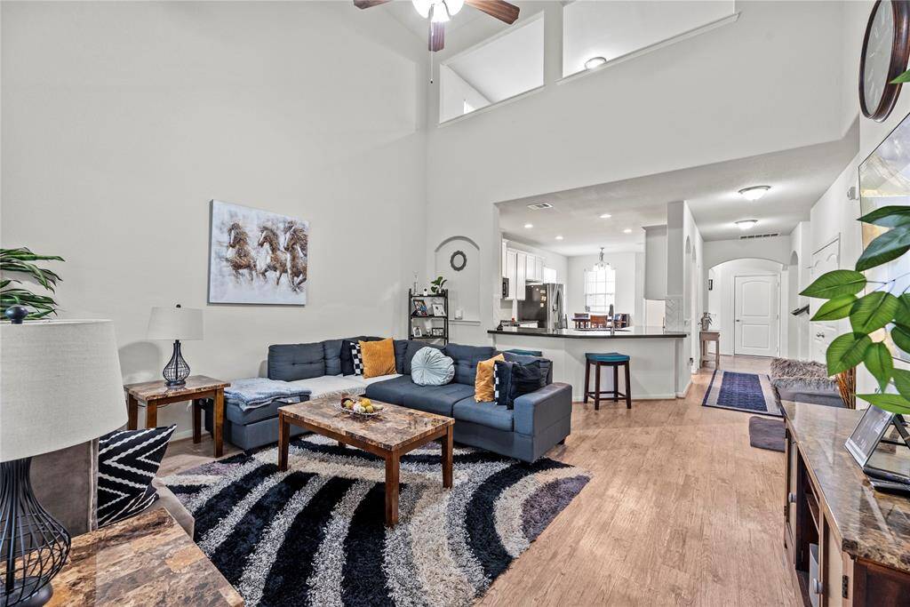 A large living area with a comfortable and inviting feel offers the perfect setting for relaxation and socializing.