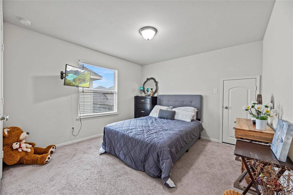 With ample room to accommodate various arrangements, your second bedroom serves as a perfect retreat for family or guests.