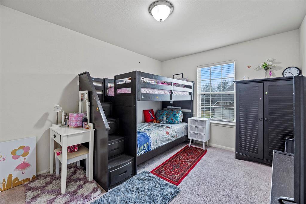 Your third bedroom offers a generous and inviting space that exudes comfort and versatility.