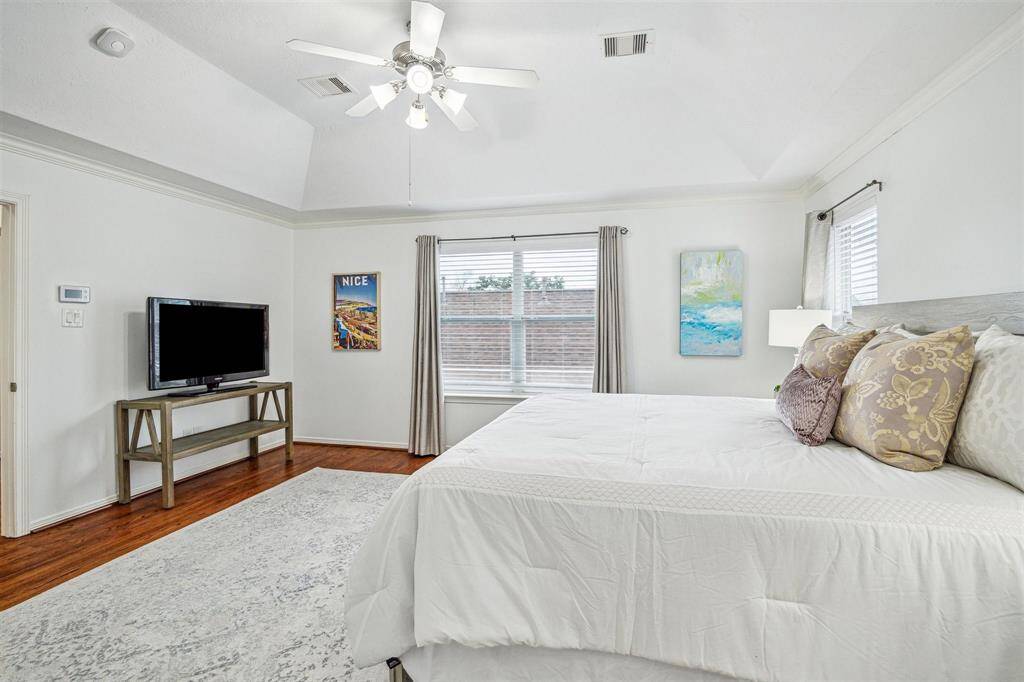 Another view of the primary bedroom.