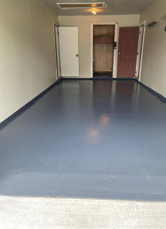 Finished garage with Laundry,  storage utility room