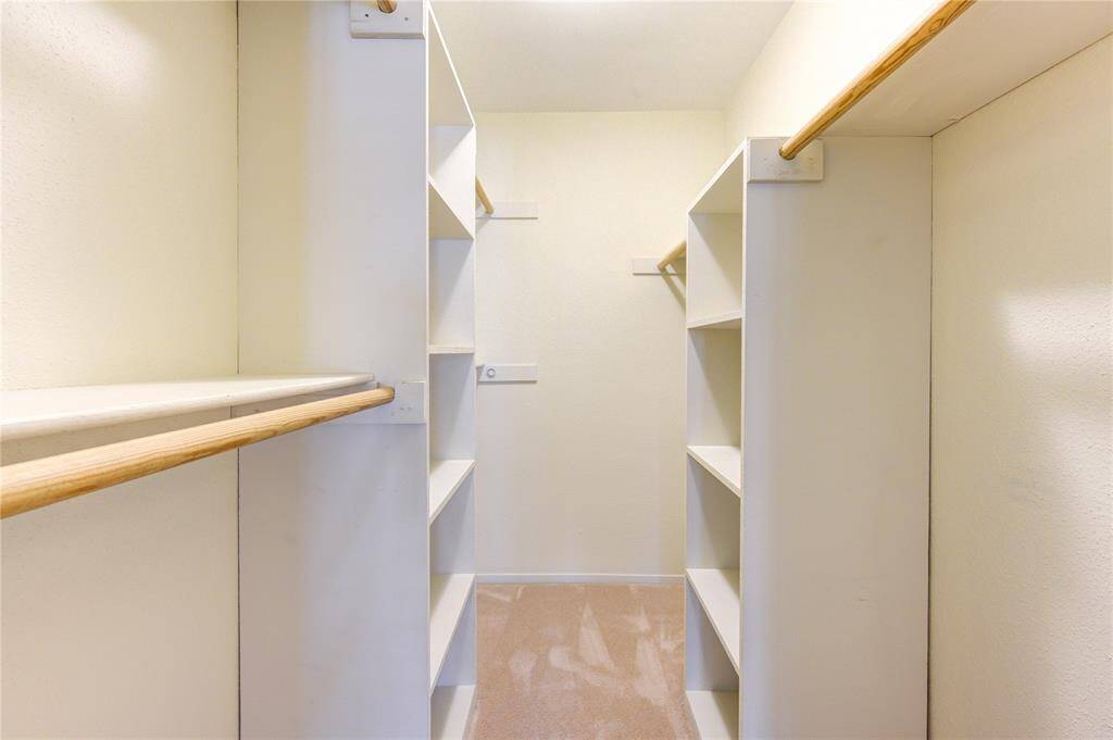 Spacious second closet in the primary bedroom, perfect for extra storage and organization.