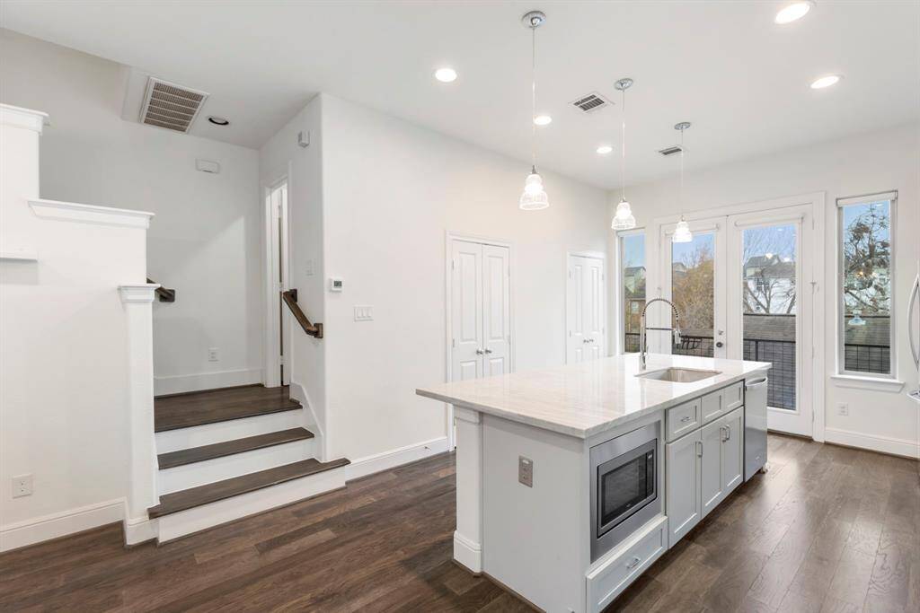 The pantry is on the left & the laundry room is on the right.