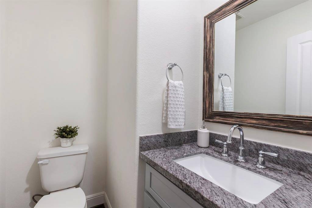 Convenient half bath on the second floor.