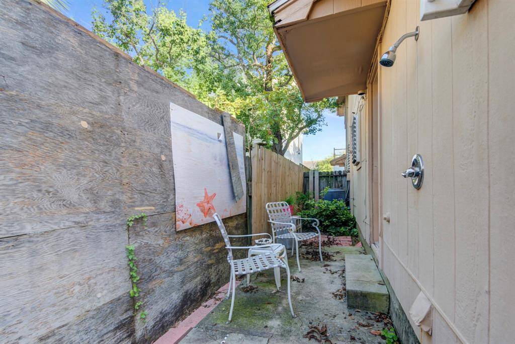 Small backyard patio and outdoor shower