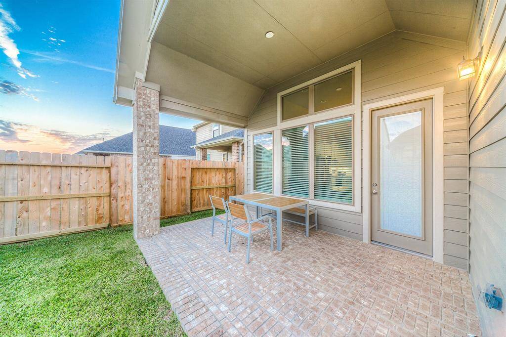 Backyard With Covered Patio