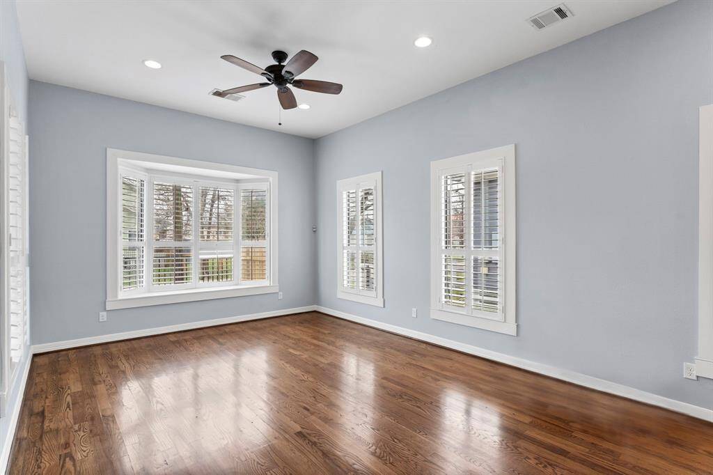 Ton's of windows for natural light and plantation shutters.