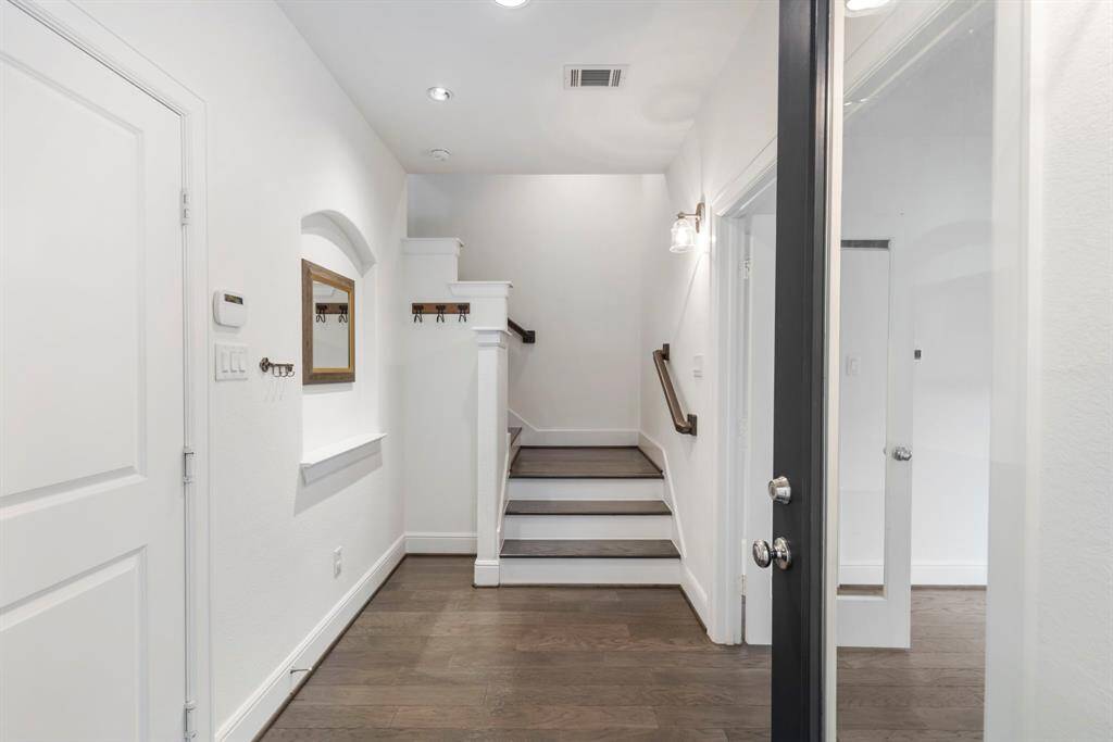 Beautiful hardwood floors welcome you as you enter the home!