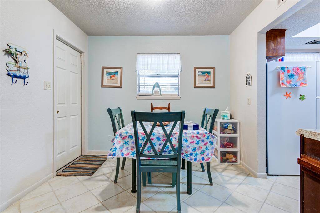 Dining room and door leading to the garage.