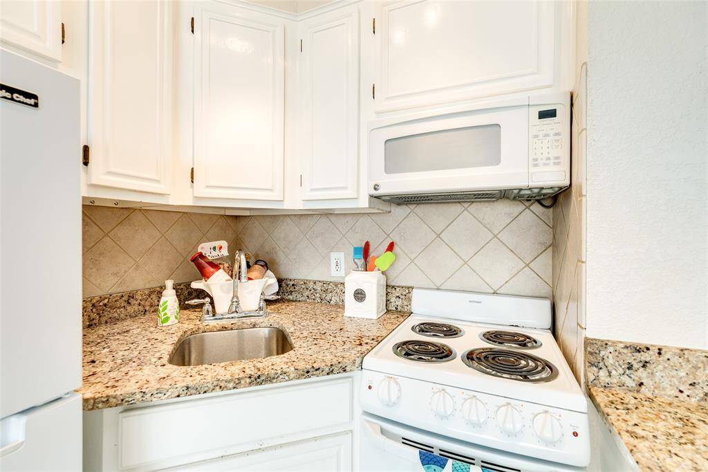Oven with cooktop and microwave included.