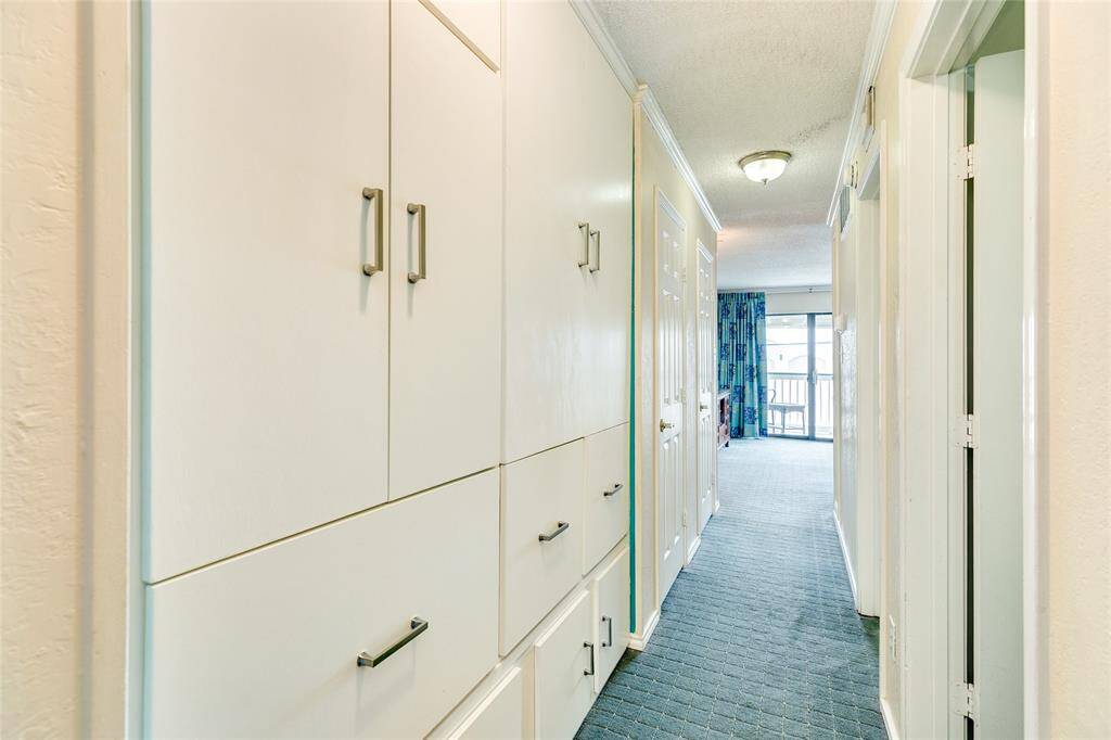 Tons of custom built-in cabinets and room for hanging clothes.  Can be converted back to bunk beds.