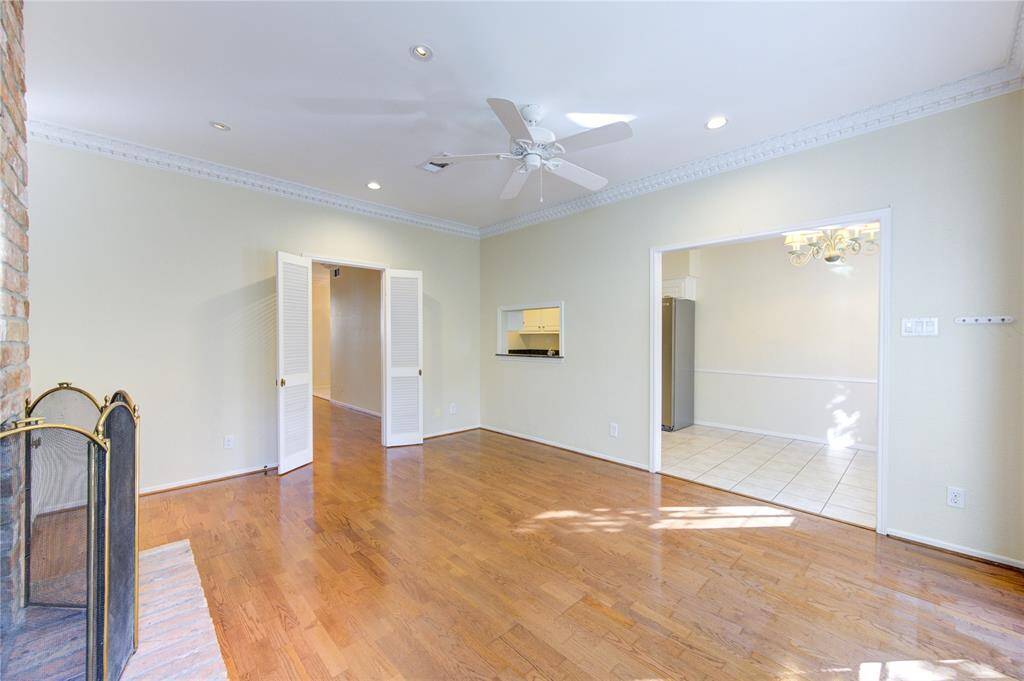 Spacious family room with seamless access to the breakfast nook and kitchen.