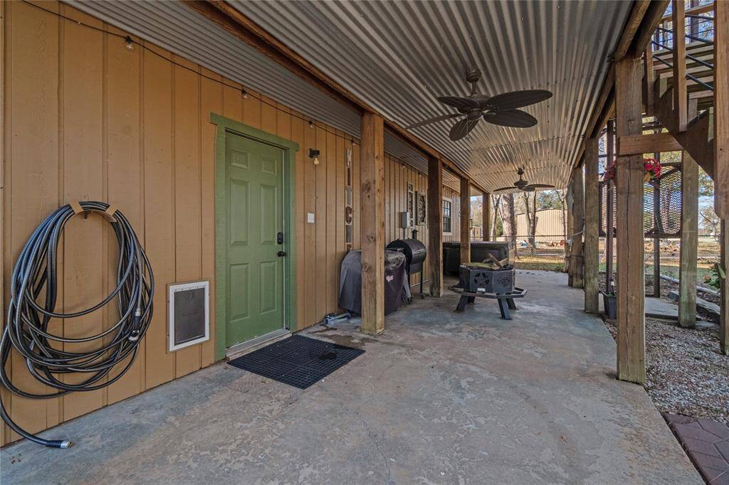Back on the ground level, entry to the garage via side door or the coded garage door