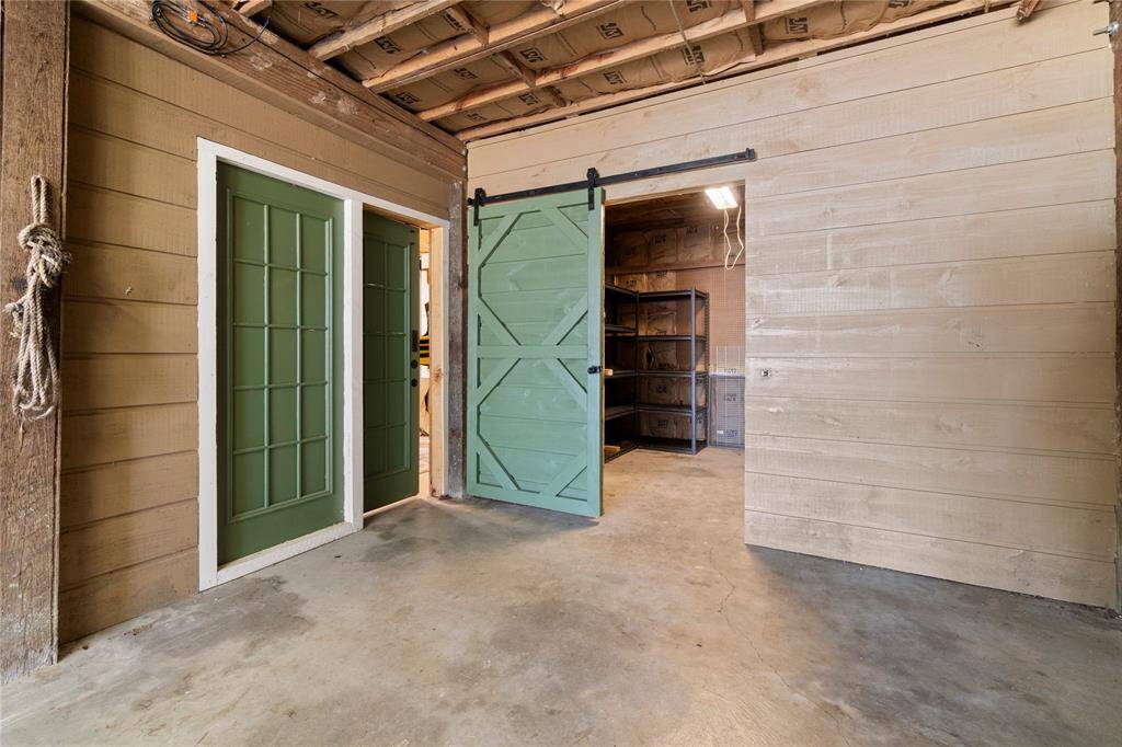 Huge garage where you will find a large bonus room, plus a storage and workshop area
