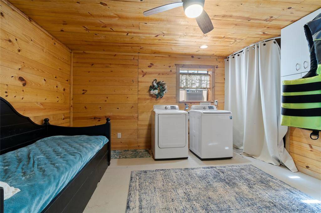 Bonus room with additional sleeping arrangement, a private 1/2 bath and the utility area.