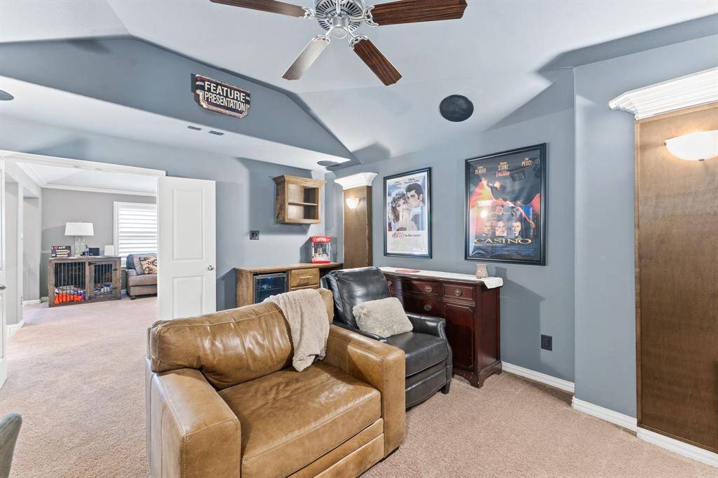 Media Room can be setup for a projection screen. Notice the rear custom built in with matching wrapped columns.