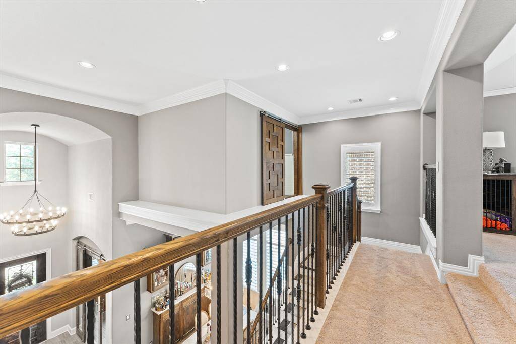 The barn door in the background contains almost 1,000 CuFt of finished storage with outlets, led lighting and tongue and groove stained ceilings