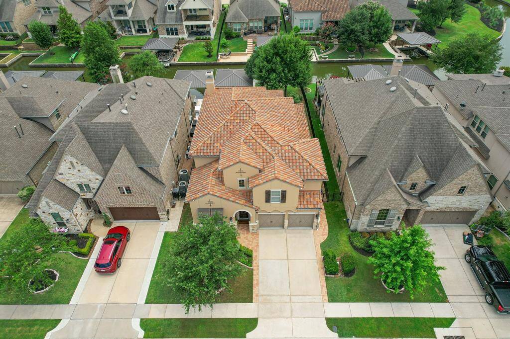 The tile roof stands out as its the only one on the street.