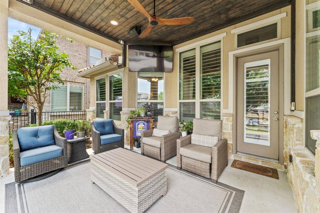 Custom patio with restoration hardware fan, led lighting, stained tongue and groove ceiling, outdoor speakers and lots of electrical outlets